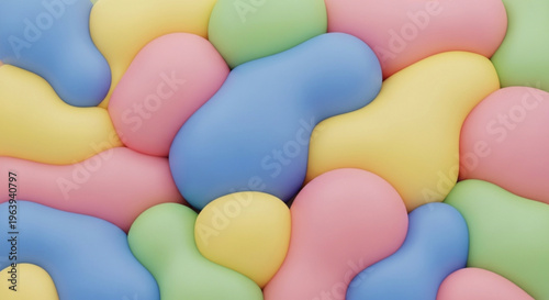 Colorful assortment of soft irregularly shaped candy pieces in pastel hues of blue pink yellow and green arranged densely together