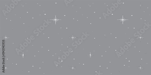 Gray background with scattered white stars and radiant sparkles