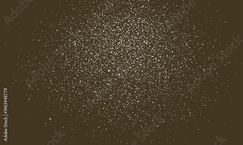 White dust particles scattered on a dark brown background