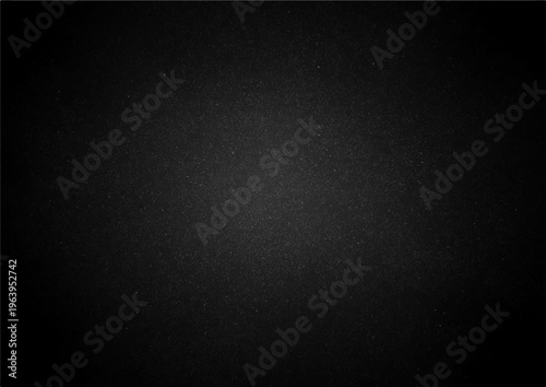 Dark gray textured surface with subtle vignette and grainy noise pattern