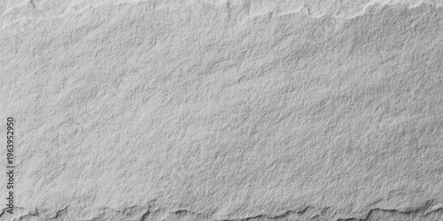 Light gray stone texture background with rough surface and natural grain