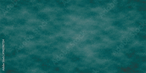 Abstract a moody image that depicts a textured, teal-colored backdrop, evoking the essence of a serene lake or a vast sea, offering an ideal canvas for various design applications. 