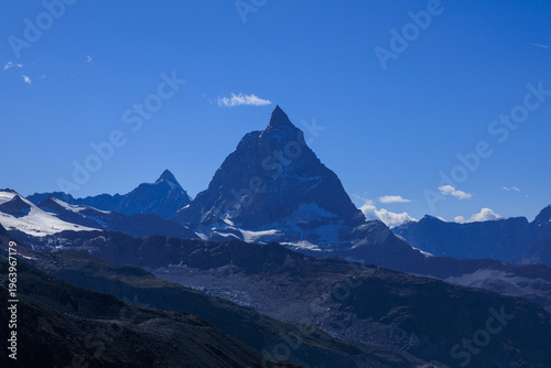 Mountain panorama with summit Matterhorn seen from mountain hut Monte Rosa Hut in summer in Swiss Alps, canton of Valais, Switzerland