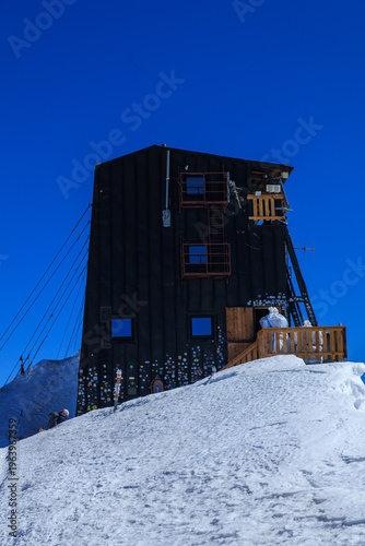 Mountain hut Margherita Hut on summit Signalkuppe at Monte Rosa massif with snow in Pennine Alps, Italy