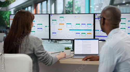 Photos Young Manager And Consultant Using Digital Workflow Software