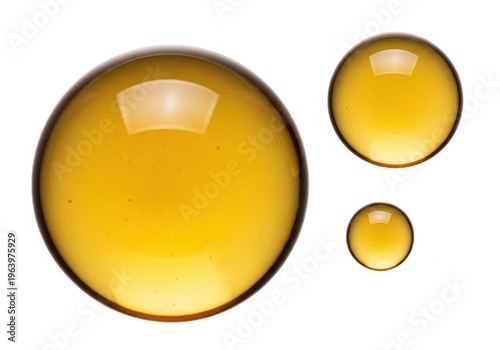 Three Different Sized Glass Lenses Displayed Against White Background