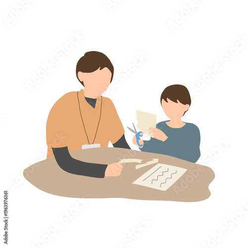 親が子どもの工作や手作業をサポートする家庭シーン