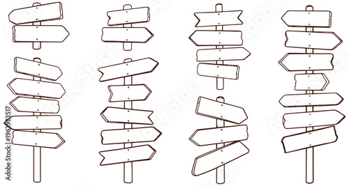 Multiple blank directional signs on wooden posts for navigation and guidance