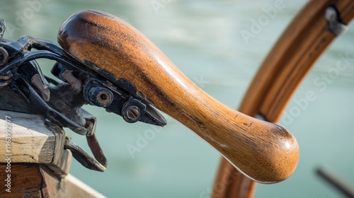 tiller. A worn wooden tiller connected to a ship's rudder on a small sailboat. mobility guides, transit brochures, designed for transport & logistics marketing, used by policy analysts.