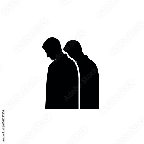 Two men standing with heads bowed in silhouette.