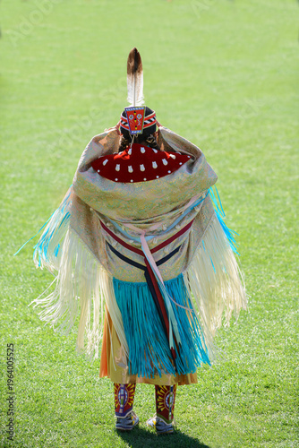 Native American women in full regalia during a pow wow