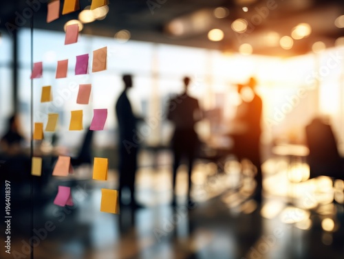 corporate team planning strategy on a blured office background with natural sunlight