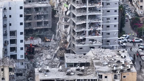Aerial view Bat Yam Iranian missile strike destruction Israel

Drone footage showing collapsed residential buildings after Iranian missile impact in Bat Yam Israel June 15 2025
