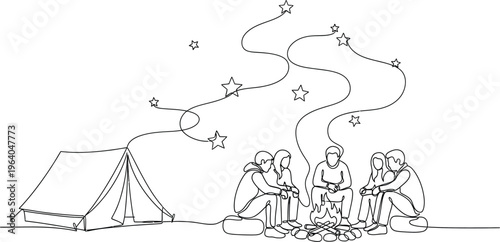 Camping friends sitting around campfire under starry night