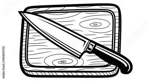 Knife on a wooden chopping board.