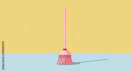 Pink Broom Standing Upright on Blue Surface with Yellow Background