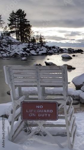 beach chair at sunset in winter landscape. Vertical design in 9:16 ratio. Smartphone and social media 