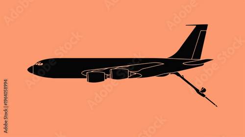 Silhouette of a military tanker aircraft in flight refueling operation.