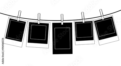 Polaroid photos hanging on line.