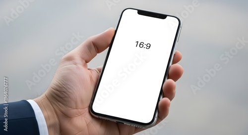 Close Up Hand Holding Modern Smartphone Displaying 16 9 Screen