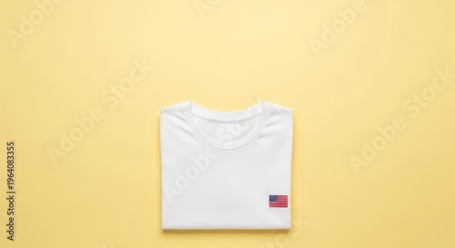 White T shirt on yellow background.