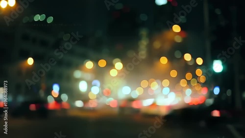 Blurry nighttime city lights with traffic