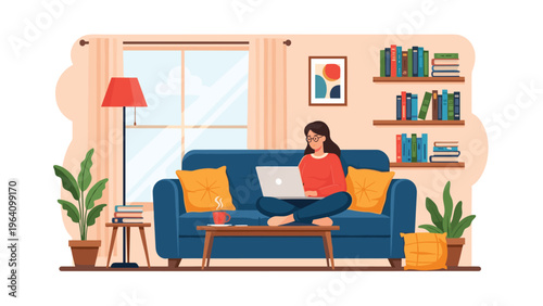 Young woman sitting comfortably on a blue sofa in a cozy living room while working on her laptop with coffee and plants.