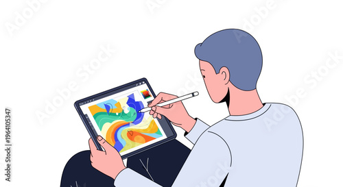 Young man artist drawing digital art on tablet screen.