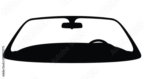 A black silhouette of a car dashboard seen through the windshield