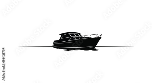 A sleek motorboat rests on calm water creating a striking silhouette