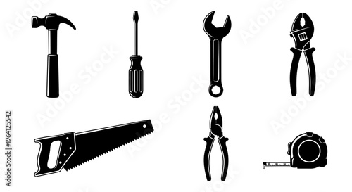 Set of black and white silhouette icons of common hand tools on a white background