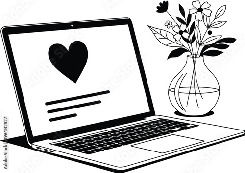 Laptop with a heart on the screen next to a vase with flowers