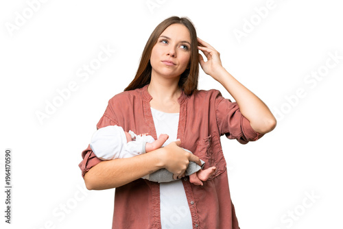 Fotografie Young blonde woman  with her newborn baby over isolated chroma key background ha