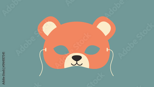 Playful bear-shaped carnival mask in shades of orange and black, featuring eye holes and ear details, against a teal background.