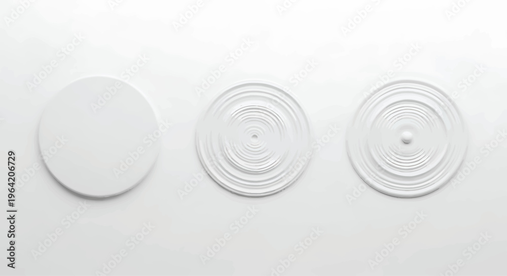 Obraz premium White Circular Objects with Concentric Rings on Plain Background