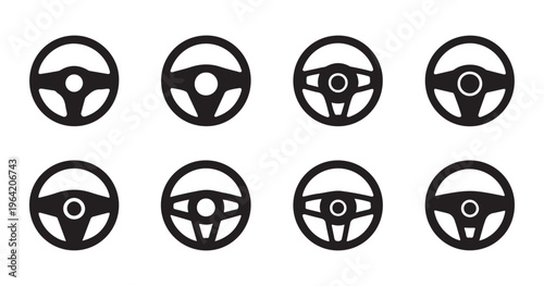Set of black silhouettes of steering wheels, a collection of flat icons.