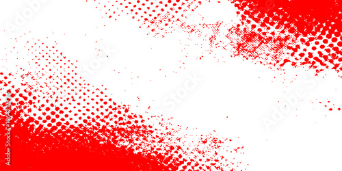 An abstract red grunge background featuring a creative design of paint splatters and ink drops with a blood-like texture for artistic Christmas decorations or a modern web wallpaper illustration