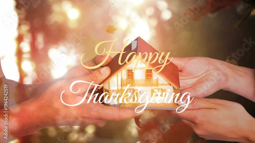 Animation of happy thanksgiving text over hands of caucasian couple holding house