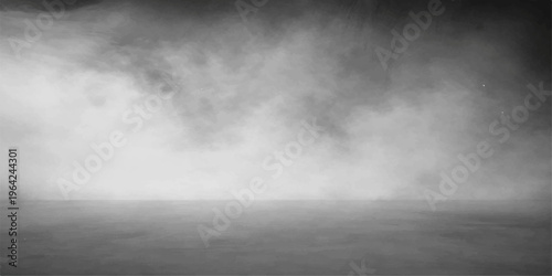 A dark and abstract black and white grunge background capturing the motion of a stormy sky filled with thick smoke and clouds over a misty night