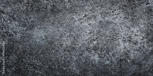 A dark grunge wallpaper featuring a rough black and white granite stone texture with a grainy marble pattern on an old grey concrete surface