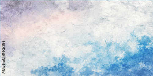 The sky painted with delicate clouds in shades of white and blue, evoking a sense of tranquility. 