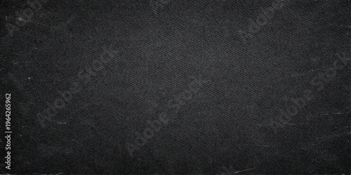 Dark chalkboard texture with subtle grain, evoking a sense of age and timelessness, suitable for texturing and background use.
