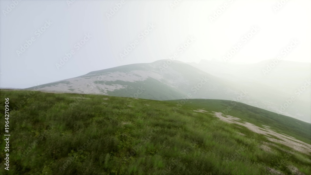 Fototapeta premium Vibrant green hills roll gently under a soft blanket of mist, as the early morning light paints the landscape in subtle hues. Nature awakens with serenity in this tranquil setting.