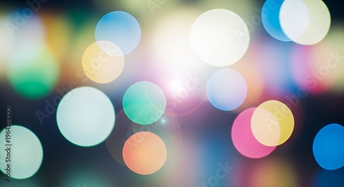 Vibrant rainbow gradient background with glowing bokeh circles and soft light particles creating dreamy abstract atmosphere.