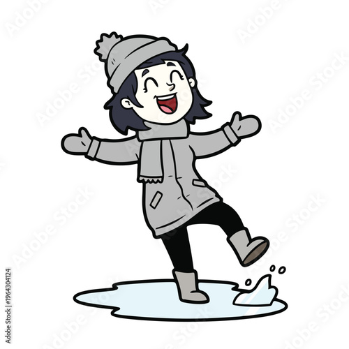 Cheerful girl in warm clothing kicking snow puddle on ground