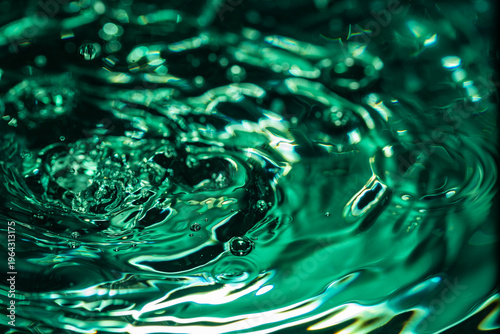 349.Green Ripples and Bubbles on Reflective Water Surface