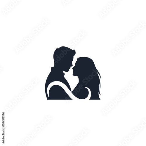 Silhouette of a loving couple embracing intimately.