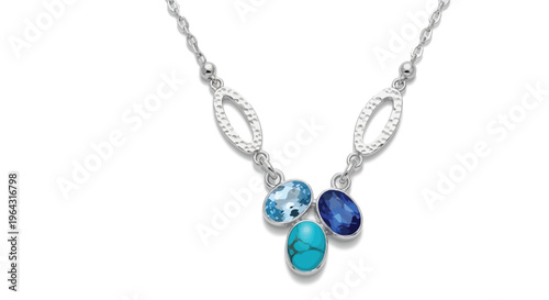 Silver necklace featuring three oval blue toned gemstones on a delicate chain