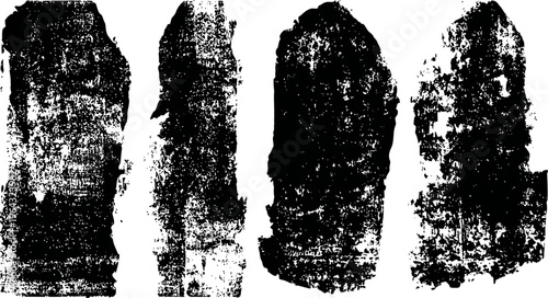 Set of four vertical black grunge ink textures with rough distressed edges and splattered patterns