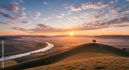 Sunset over rolling hills landscape.